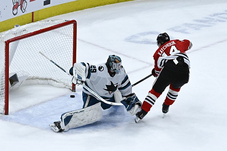 Chicago Blackhawks left wing Boris Katchouk (14) scores the game winning overtime goal past San Jose Sharks goaltender Mackenzie Blackwood