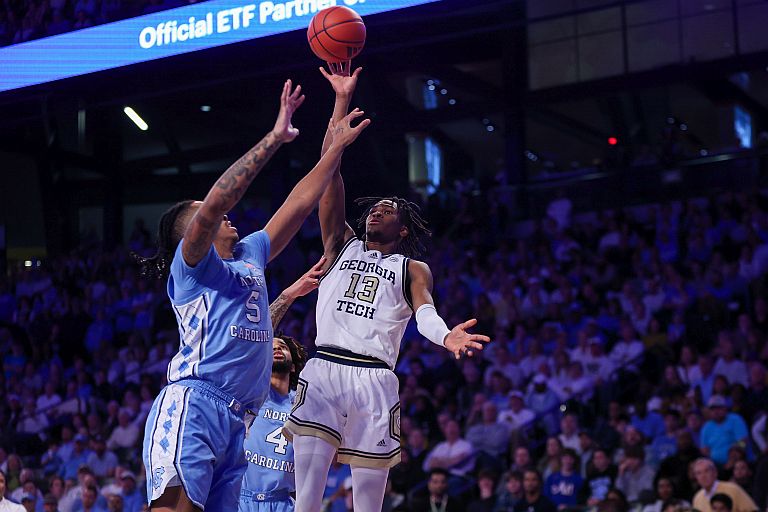 Georgia Tech Yellow Jackets guard Miles Kelly (13) shoots over North Carolina Tar Heels forward Armando Bacot