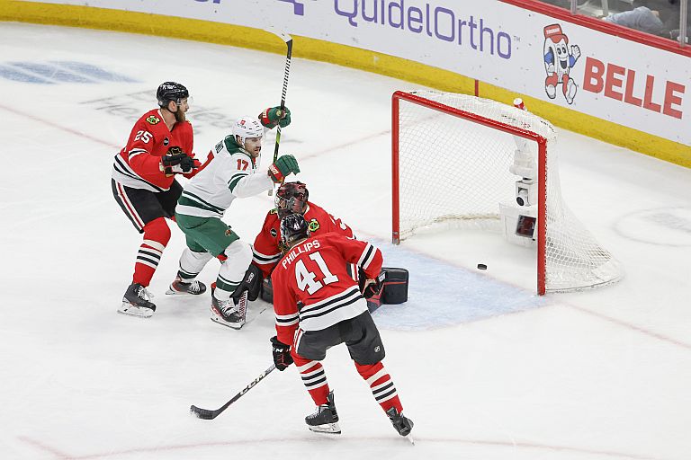 Minnesota Wild left wing Marcus Foligno (17) celebrates after scoring against Chicago Blackhawks goaltender Petr Mrazek