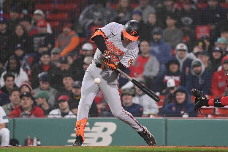 Baltimore Orioles designated hitter Ryan O'Hearn (32) hits a double during the tenth inning against the Boston Red Sox
