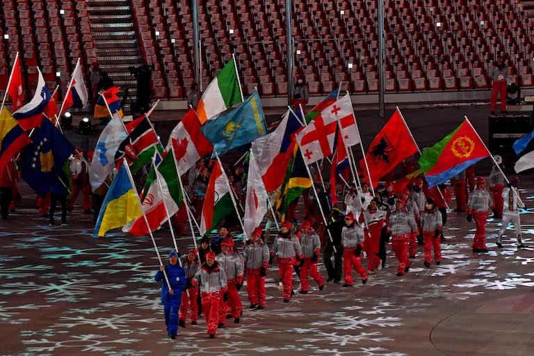 Feb 25, 2018; PyeongChang, South Korea; Country flags are marched into the stadium during the closing ceremony for the Pyeongchang 2018 Olympic Winter Games at Pyeongchang Olympic Stadium. Mandatory Credit: Michael Madrid-USA TODAY Sports