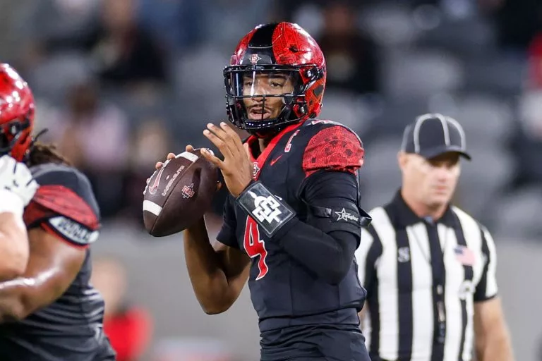 Jayden Denegal looks to lead the Aztecs over the Cowboys