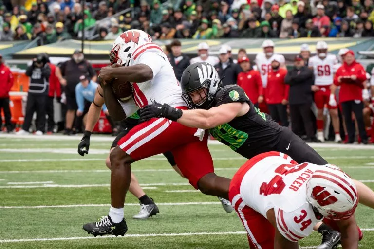 Gideon Ituka looks to lead the Badgers over the Huskies